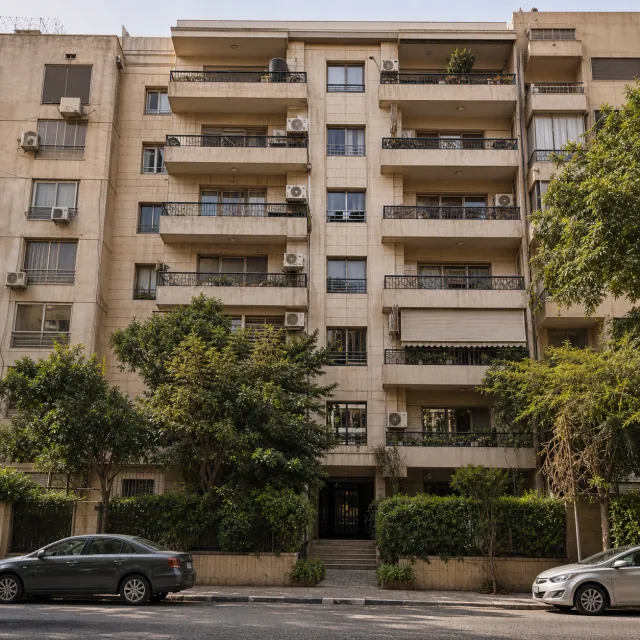 تصور بصري توضيحي لواجهة عمارة سكنية بطابع مدينة نصر